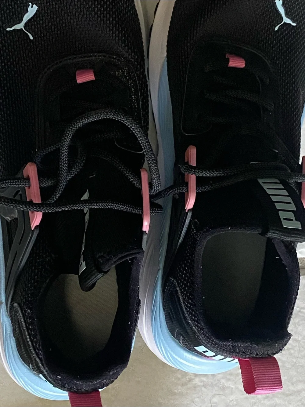 Puma black sneakers